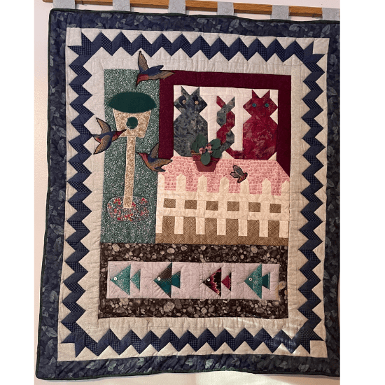 Elana made a cat country style quilt