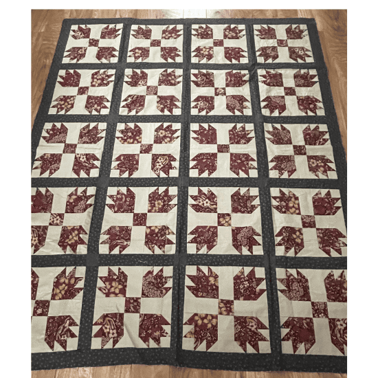 Traditional bear paw quilt red and white colors